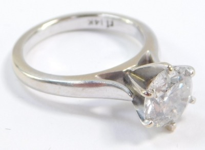 A diamond solitaire ring, high claw set in white metal, stamped 14k, approximately 2cts, size J/k, 4.4g. - 4