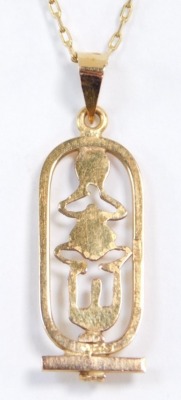 An Egyptian hieroglyph pendant, yellow metal, on a belcher link neck chain, stamped 585, 4.2g all in. - 2