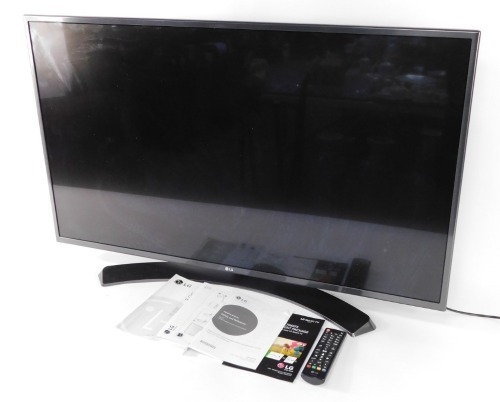 A LG 43" LCD television, Model No 43UH661V, with power lead, remote and instructions.