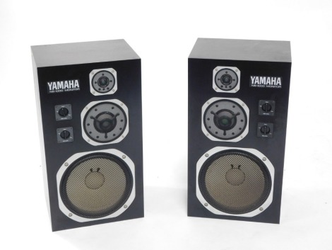 A pair of Yamaha NS-100 monitor speakers, 68cm high, 38cm wide.