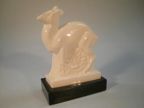 A Wedgwood cream glazed pottery figure of a standing Duiker designed by John Skeaping