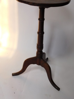 A 19thC oak wine table, the circular top on a turned column and tripod base, the top 36cm diameter. - 3