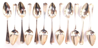 Twelve Dutch silver table spoons, monogram engraved, assay mark for The Hague, 22.10oz.