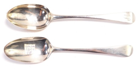 A George III silver table or dessert spoon, James Phipps I, London 1787, initial engraved, and a further spoon, William Eley & William Fearn, London 1805, initial engraved, 4.02oz. (2)