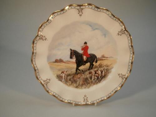 A Royal Crown Derby plate with a hand painted hunting scene of huntsmen