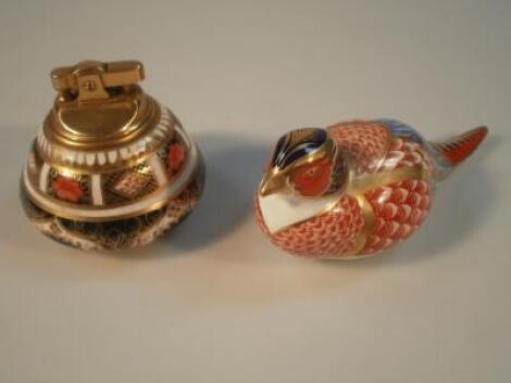 A Royal Crown Derby Imari pattern 'Pheasant' paperweight and a Royal Crown