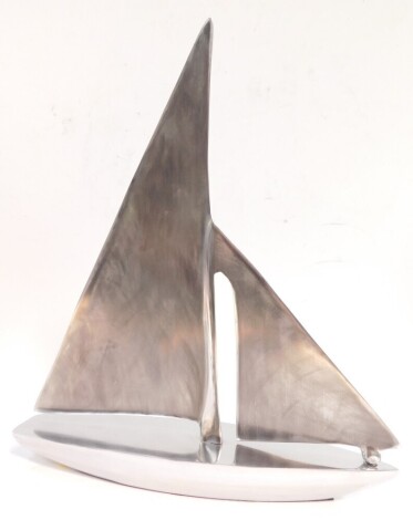 An Art Deco style aluminium model of a yacht, 37cm high, 30.5cm wide.