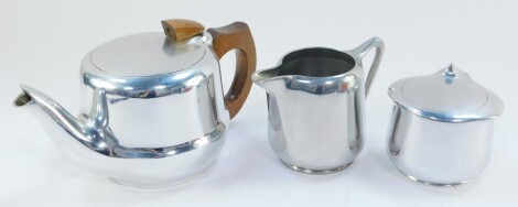 A Picquot ware three piece tea set, comprising teapot, cream jug and sucrier.