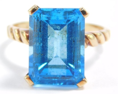 An emerald cut topaz ring, set in yellow metal, stamped 14ct and VAN CLEEF & ARPELS, size N, 5.8g.