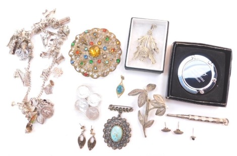 Silver and costume jewellery, to include curb link charm bracelet, Victorian threepenny bit coin brooch, and a filigree brooch. (a quantity)