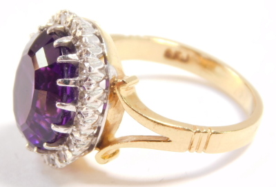 A 18ct gold and amethyst ring, oval cut in a surround of diamonds, amethyst approximately 5ct, size K/L, 6.5g. - 3