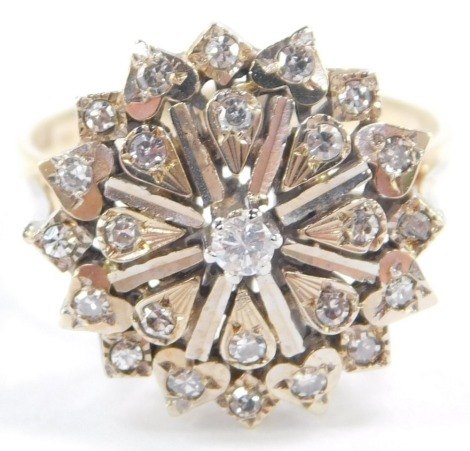 A 9ct gold and diamond flower head ring, in a basket setting, size O/P, 4.1g.