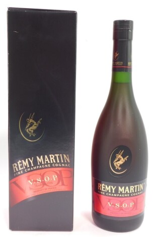 A bottle of Remy Martin VSOP Cognac, boxed.