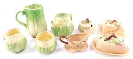 Sylvac and Wade moulded ceramics, and a Portland Pottery Company three piece tea set of moulded cauliflower form. (7)