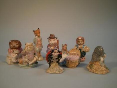 A collection of Beatrix Potter figures