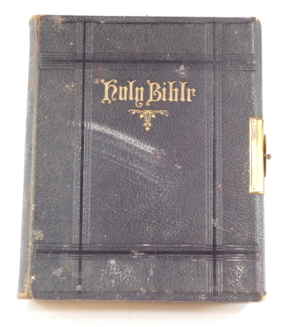 The Holy Bible, containing the Old and New Testaments, gilt tooled black cloth, with brass clasp, published by George Eyre & William Spottiswoode, London.