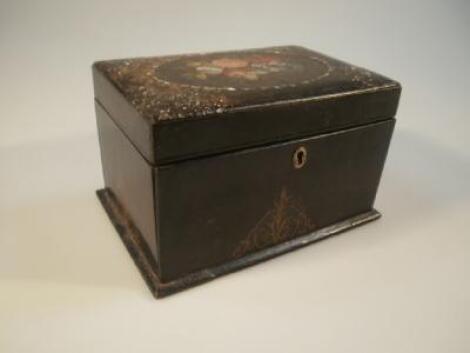 A Victorian lacquered tea caddy