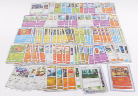 Japanese Pokemon Sun and Moon Series cards, Tag Bolt, SM9, to include Charizard 013/095., Moltres 018/095., Gyarados 028/095., Eevee and Snorlax GX 066/95., Pokemon Communication 082/095., Bill's Analysis 089/095, Kangaskahn 074/095., Rare Candy 081/095.,