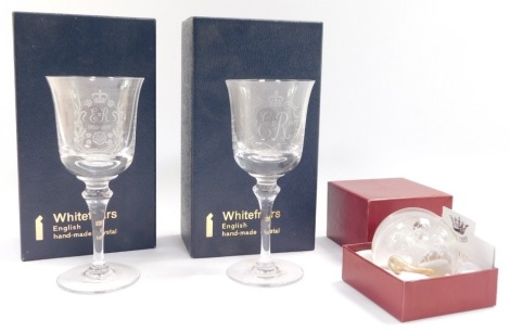 Two Whitefriars crystal wine glasses for the 1977 Silver Jubilee, boxed, and a Royal Crest Cirus boxed paperweight. (3)