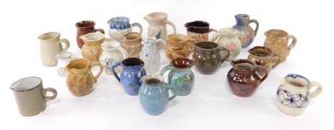 A collection of Studio pottery jugs, various makers and designs, to include Alvingham, R O Scott, etc. (2 trays)