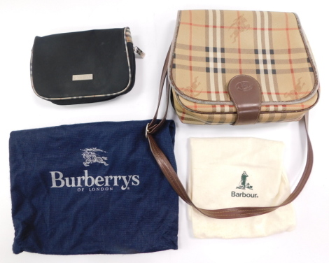 A vintage Burberry's canvas check shoulder bag, with brown leather trim and shoulder strap, the fold over flap containing one zip and two open compartments, with dustbag, (AF), 23cm high, 26cm wide, 6cm deep, together with a Burberry zipped black and chec