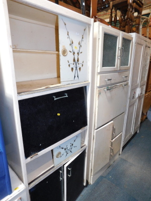 Two 1950's kitchen larder cupboards, together with a painted oak cupboard. (3)