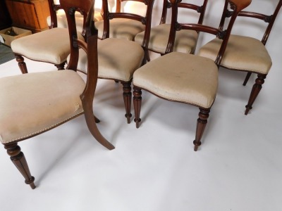 A set of eight Victorian mahogany dining chairs, each with a shaped leaf carved bar back, a padded serpentine fronted seat, on turned and fluted legs. - 3