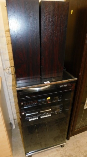 A Sanyo hi-fi system, in cabinet with two speakers, to include a Sanyo turntable TP266, amplifier JA266, stereo tuner JT266L and double cassette deck RDW266.