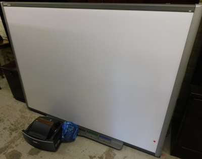 A Smart Tech smart board interactive white board, to include board WT610 projector and support rail, 133cm high, 161cm wide.