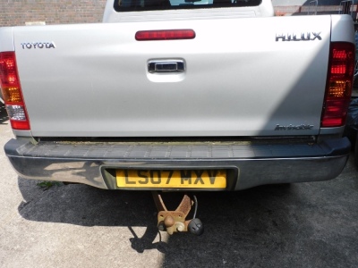 A Toyota Hilux Invincible 3.0D-4D pick up truck, registration LS07MXV, in silver with spare wheel, and two keys, mileage 51,670. Notes: No V5 currently located. HPI checked. One former keeper. SORN with an MOT expiry on 21st July 2021. To be sold upon ins - 3