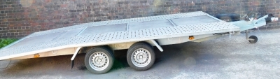 A Jupiter car transporter trailer, 2700kg, model GA1500, SZRBR2000K 0012210, with retail stamp from AM-Marc, with hoist pull spare tyre and two car ramps. To be sold upon instructions from the Executors of Michael Davison (Dec'd)