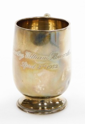 A silver child's tankard, with engraving Timothy William Howarth April 3rd 1952, Birmingham 1946, 3oz, 9cm high. - 2