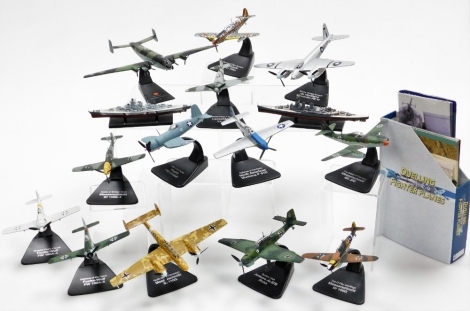 A group of diecast model aircrafts, to include mainly examples on stands, to include Burma Bridge Busters, Russia Front Kursk, Nazi German 1944 Junkers Jew, War In The Pacific, Vought F4U Corsair, Battle of Britain 1940, Messerschmitt Bf 109 E-4, Defence 