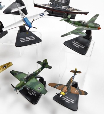 A group of diecast model aircrafts, to include mainly examples on stands, to include Burma Bridge Busters, Russia Front Kursk, Nazi German 1944 Junkers Jew, War In The Pacific, Vought F4U Corsair, Battle of Britain 1940, Messerschmitt Bf 109 E-4, Defence - 3