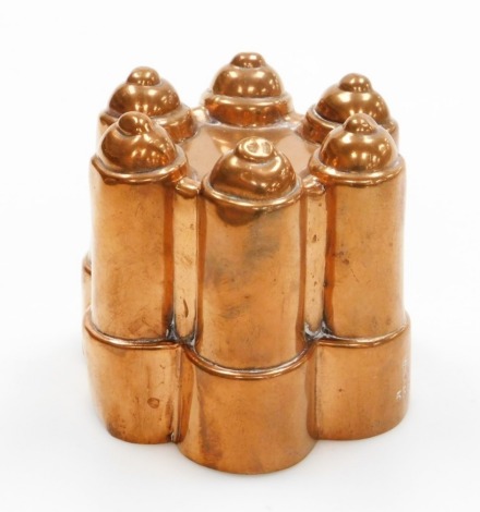 A Victorian Benham and Froud copper jelly mould, with six point turret detailing, numbered 532 with alban cross stamp and heart stamp, 10cm high, 11cm wide.