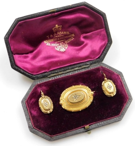 A Victorian bloomed gold and seed pearl set brooch and earring set, in T&J Adams and Sons of London box, to include a memorial brooch with single pin back, 3.5cm, wide, and a pair of drop earrings in similar design, 3g all in.