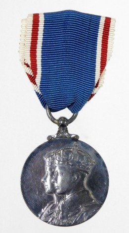 A George VI Coronation medal 1937, with ribbon.