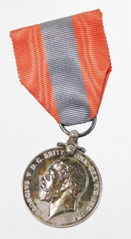 A George I Faithful Service Medal, inscribed to Alfred Edward Phillips.