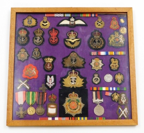 Military cloth badges, to include some reproductions Royal Corps of Transport, RAF and others. (36 and 4 bars, cased)