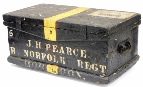 A Royal Norfolk Regiment army chest for J H Pearce of The Norfolk Regiment, with applied Bodon paper label painted black with a yellow stripe, 39cm high, 100cm wide, 50cm deep.