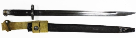 An early 20thC bayonet, with various military stamps and emblems dated 1907 Sander, 58cm long.