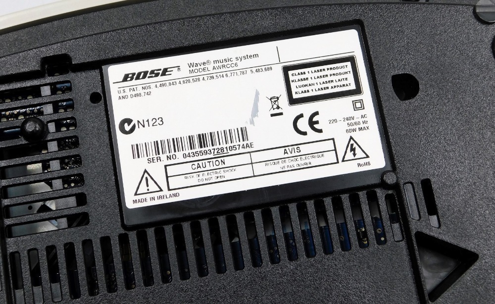 A Bose Wave music system model AWRCC6, with remote control.