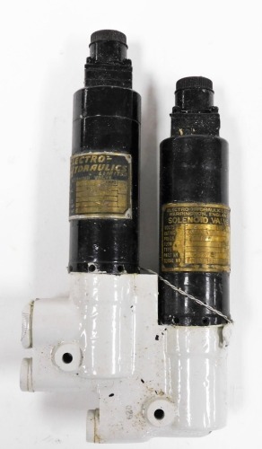 An Electro Hydrolics Limited solenoid valve, serial number EHLW/18E 738, 20cm long.