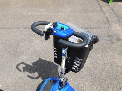 An Illusion mobility scooter, model Komfi Rider Vogue manufacturer 1 Rehab, with instruction guide and device history record from 1 Rehab, with battery charger and two keys, in blue. - 2