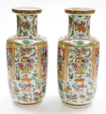 A pair of 19thC Chinese Canton porcelain baluster vases, with scenes of figures at court within a key fret border and background of various butterflies, 44cm high. (AF - minor restoration) Provenance: 1988 Lyall & Co sale at The Bourne Auction Rooms of th - 15