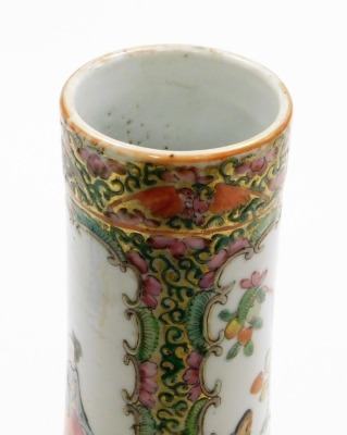 A 19thC Chinese Canton porcelain bottle vase, with slender neck, decorated in enamels with traditional court scenes and opposing panels of birds and flora, 35cm high. (AF - heavily restored with most of the bottom section having been rebuilt) - 17