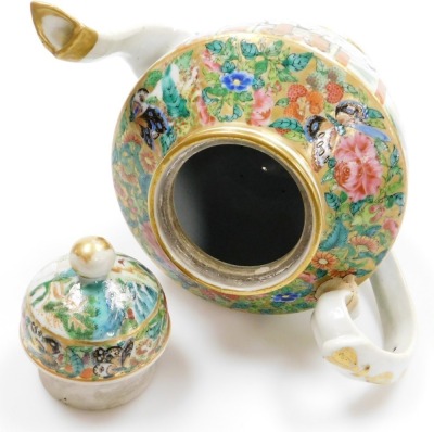 A 19thC Chinese Canton porcelain teapot, of ovoid form, the body with a continuous band of figural decoration, below butterflies and flora on a gilt ground, the domed lid with spherical knop,22cm high. (AF) - 19