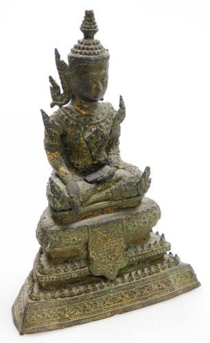 A Thai bronze figure of a seated Buddha, on a Tiered base, 19cm high.