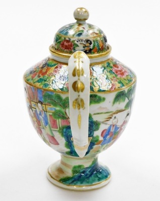 A 19thC Chinese Canton porcelain teapot, of ovoid form, the body with a continuous band of figural decoration, below butterflies and flora on a gilt ground, the domed lid with spherical knop,22cm high. (AF) - 9