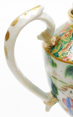 A 19thC Chinese Canton porcelain teapot, of ovoid form, the body with a continuous band of figural decoration, below butterflies and flora on a gilt ground, the domed lid with spherical knop,22cm high. (AF) - 14